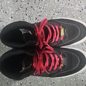 Vans Black and Red High-Top Sneakers. Caballero